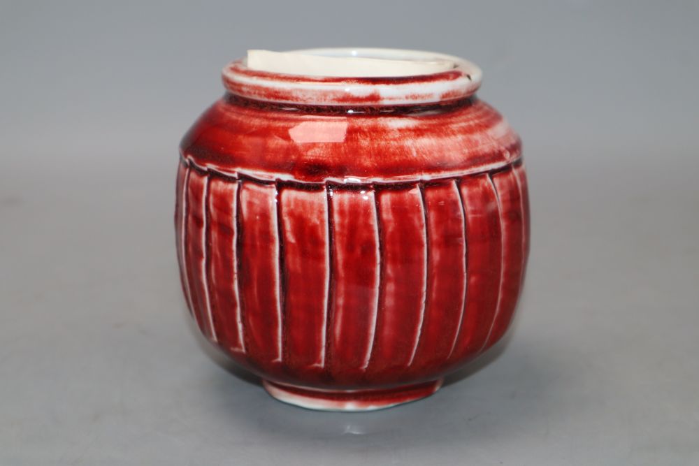 A David Leach fluted porcelain ox blood glazed vase, signed, with letter from David Leach, height 12cm